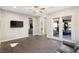 Spacious living room with hardwood floors and sliding glass doors to the backyard at 8075 Palm Cove Ct, Las Vegas, NV 89129