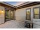 Outdoor patio features brick pavers and a seating area at 8075 Palm Cove Ct, Las Vegas, NV 89129