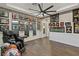 Spacious room showcasing sports memorabilia and a massage chair at 8075 Palm Cove Ct, Las Vegas, NV 89129