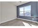 Well-lit bedroom with large window and wood-look floors at 852 Sistine St, Las Vegas, NV 89144