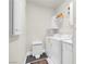 Laundry room with washer, dryer, and cabinets at 8725 Red Brook Dr # 104, Las Vegas, NV 89128