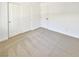 Spacious bedroom with double-door closet and neutral carpet at 9012 Medicine Wheel Ave, Las Vegas, NV 89143