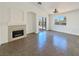 Bright living room with tile flooring and a fireplace at 9012 Medicine Wheel Ave, Las Vegas, NV 89143