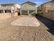 Small backyard with a brick patio and gravel at 9801 Fast Elk St, Las Vegas, NV 89143