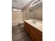 Simple bathroom with single vanity and tub shower combo at 9801 Fast Elk St, Las Vegas, NV 89143