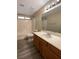 Simple bathroom with single vanity and tub shower combo at 9801 Fast Elk St, Las Vegas, NV 89143