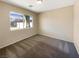 Bright bedroom with neutral walls and carpet flooring at 9801 Fast Elk St, Las Vegas, NV 89143