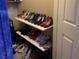 Walk-in closet with shelves filled with shoes and other storage items at 10997 Sardinia Sands Dr, Las Vegas, NV 89141