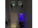 View of the front door, decorated windows and chandelier in a light grey entryway at 10997 Sardinia Sands Dr, Las Vegas, NV 89141