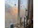 A close up of a window with a view of a sink and lots of decorations at 10997 Sardinia Sands Dr, Las Vegas, NV 89141