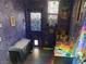 Unique room with stained glass windows and a vibrant, colorful design at 10997 Sardinia Sands Dr, Las Vegas, NV 89141