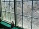 Close up on a window with a decorative leaf pattern at 10997 Sardinia Sands Dr, Las Vegas, NV 89141
