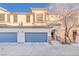 Two-story stucco home with two-car garage and landscaped front yard at 1172 Via Ponte, Henderson, NV 89052