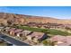 Residential neighborhood with golf course and mountain backdrop at 1461 Sunshine Ct, Mesquite, NV 89034