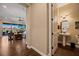 Powder room with pedestal sink and view into living room at 1461 Sunshine Ct, Mesquite, NV 89034