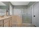 Bathroom with walk-in shower, double vanity, and accessible tub at 2009 Fern Hill Ct, Henderson, NV 89052