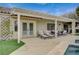 Covered patio with double doors leading to the inside at 2009 Fern Hill Ct, Henderson, NV 89052