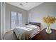 Spacious bedroom with double doors leading to outside at 2428 Granada Bluff Ct, Las Vegas, NV 89135