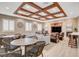 Community room with comfortable seating, a large TV, and a kitchenette at 2428 Granada Bluff Ct, Las Vegas, NV 89135