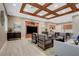 Community room with kitchen, comfortable seating and large screen TV at 2428 Granada Bluff Ct, Las Vegas, NV 89135