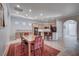 Kitchen and dining area with hardwood floors and an open concept at 2428 Granada Bluff Ct, Las Vegas, NV 89135
