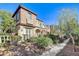Two-story home with balcony and landscaping at 2428 Granada Bluff Ct, Las Vegas, NV 89135