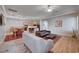 Bright and airy living room with hardwood floors and open floor plan at 2428 Granada Bluff Ct, Las Vegas, NV 89135