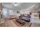 Open living room with views into the kitchen and dining area at 2428 Granada Bluff Ct, Las Vegas, NV 89135