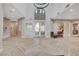 Bright and airy lobby with herringbone floors at 2428 Granada Bluff Ct, Las Vegas, NV 89135