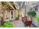 Brick paved patio with seating area and landscaping at 2428 Granada Bluff Ct, Las Vegas, NV 89135
