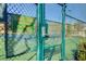 Gated tennis court with keypad entry at 2428 Granada Bluff Ct, Las Vegas, NV 89135