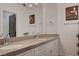 Double vanity bathroom with modern fixtures and neutral tones at 358 E Torino Ave, Las Vegas, NV 89123