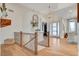 Bright entryway with hardwood floors and an open staircase at 358 E Torino Ave, Las Vegas, NV 89123