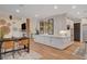 Open concept kitchen with white cabinets and a large island at 358 E Torino Ave, Las Vegas, NV 89123