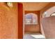 Private patio with terracotta colored walls at 3975 N Hualapai Way # 267, Las Vegas, NV 89129