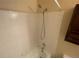 Simple bathroom with shower/tub and white tile at 4111 Sanderling Cir # 354, Las Vegas, NV 89103