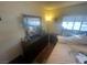 Bedroom with bed, dresser, and large mirror at 4111 Sanderling Cir # 354, Las Vegas, NV 89103