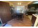 Dining area with kitchen access and hardwood floors at 4111 Sanderling Cir # 354, Las Vegas, NV 89103
