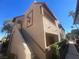 Spanish style condo building with stairs and landscaping at 4111 Sanderling Cir # 354, Las Vegas, NV 89103