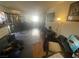 Living room with hardwood floor, fireplace, and access to patio at 4111 Sanderling Cir # 354, Las Vegas, NV 89103