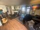 Living room with fireplace, hardwood floors, and patio access at 4111 Sanderling Cir # 354, Las Vegas, NV 89103