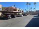 Condo complex parking lot with covered spaces at 4111 Sanderling Cir # 354, Las Vegas, NV 89103