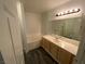 Bathroom featuring a single sink vanity and a soaking tub at 4316 W Lake Mead Blvd # 102, Las Vegas, NV 89108