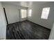 Bedroom with multiple windows and a sliding door closet at 4316 W Lake Mead Blvd # 102, Las Vegas, NV 89108