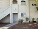Close up of an apartment exterior showcasing the entrance with pathway and desert landscaping at 4316 W Lake Mead Blvd # 102, Las Vegas, NV 89108