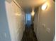 Hallway area with multiple doors and a closet with lots of storage space at 4316 W Lake Mead Blvd # 102, Las Vegas, NV 89108