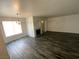 Inviting living room featuring stylish hardwood floors, a fireplace, and natural light at 4316 W Lake Mead Blvd # 102, Las Vegas, NV 89108
