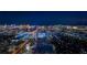 Night aerial view of Las Vegas, highlighting the property's vibrant surroundings at 4381 W Flamingo Rd # 2016, Las Vegas, NV 89103