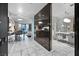 Modern bathroom with glass shower, marble vanity, and contemporary fixtures at 4381 W Flamingo Rd # 2016, Las Vegas, NV 89103