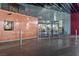 Modern building entrance with glass doors and stone facade at 4381 W Flamingo Rd # 2016, Las Vegas, NV 89103